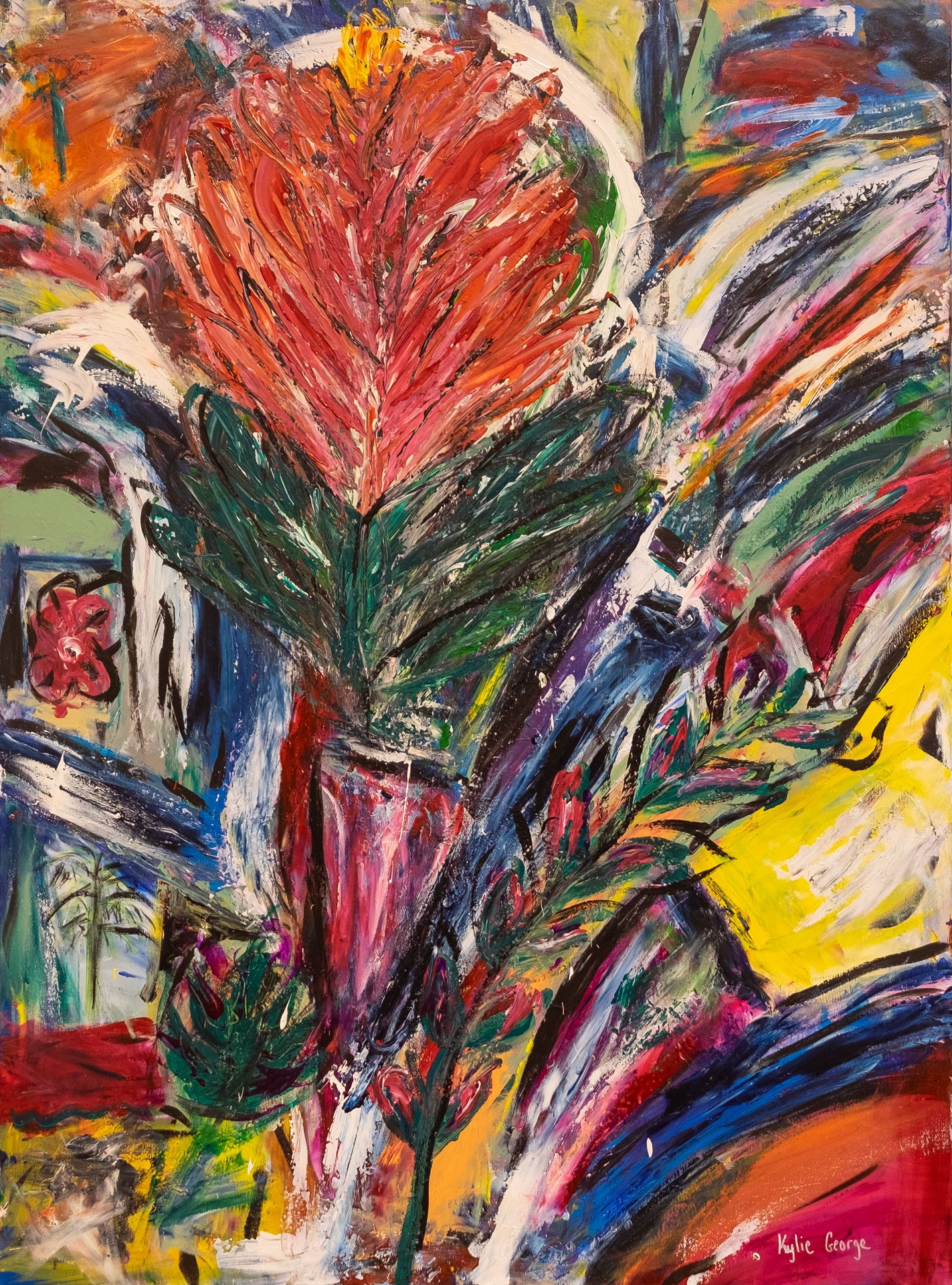 Woman in knee-length print dress walking down runway